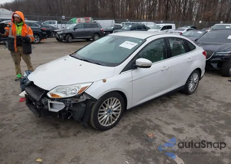 2012 Ford Focus Sel z USA, uszkodzony, nr VIN 1FAHP3H26CL230480